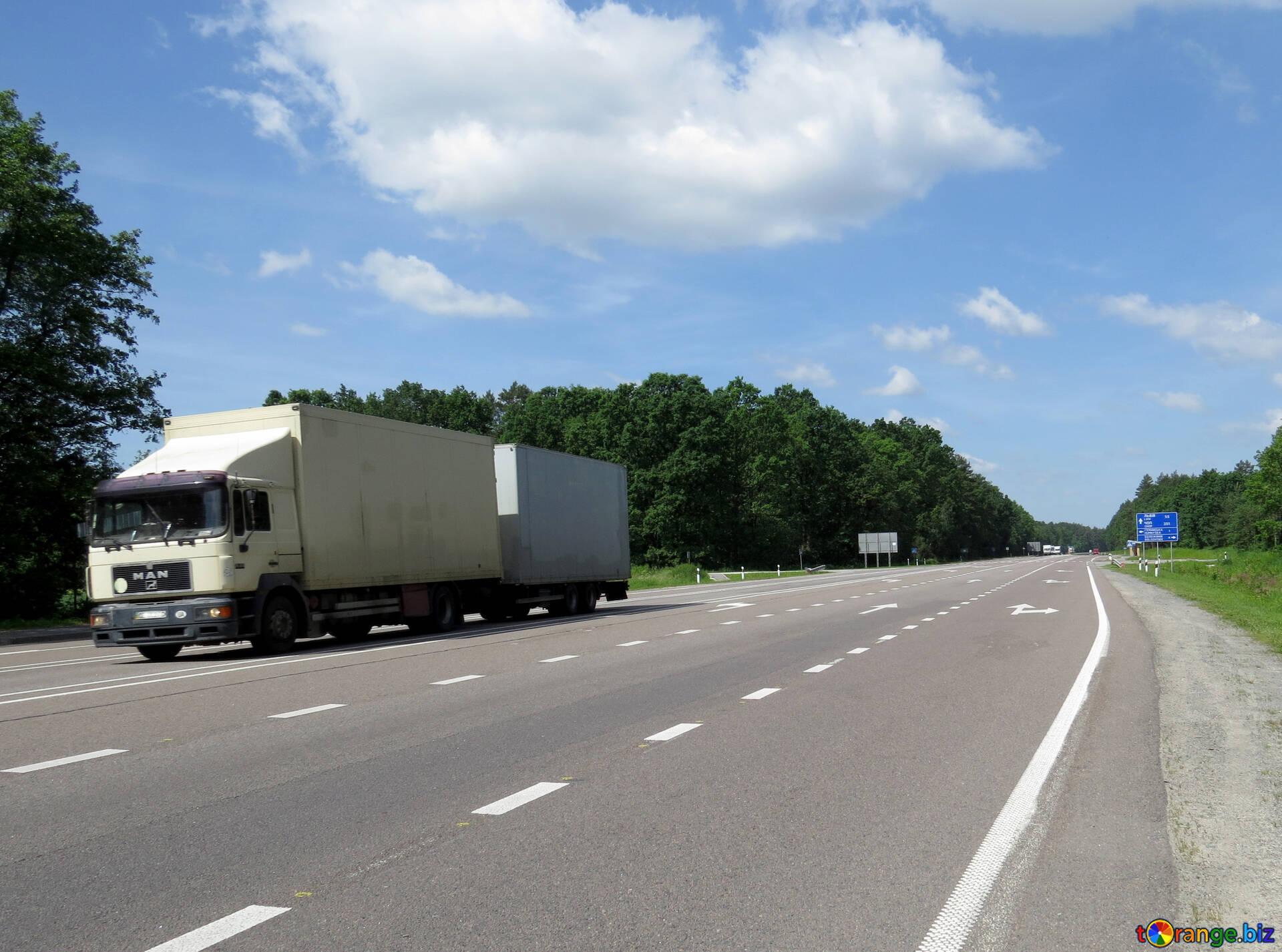 Form 2290 deadline 2026 highway vehicle on a rural road